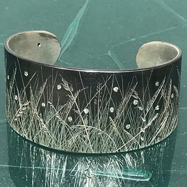 Women’s bespoke engagement ring-Oxidized Fine Silver Meadow Grass Cuff with 16 diamond fireflies