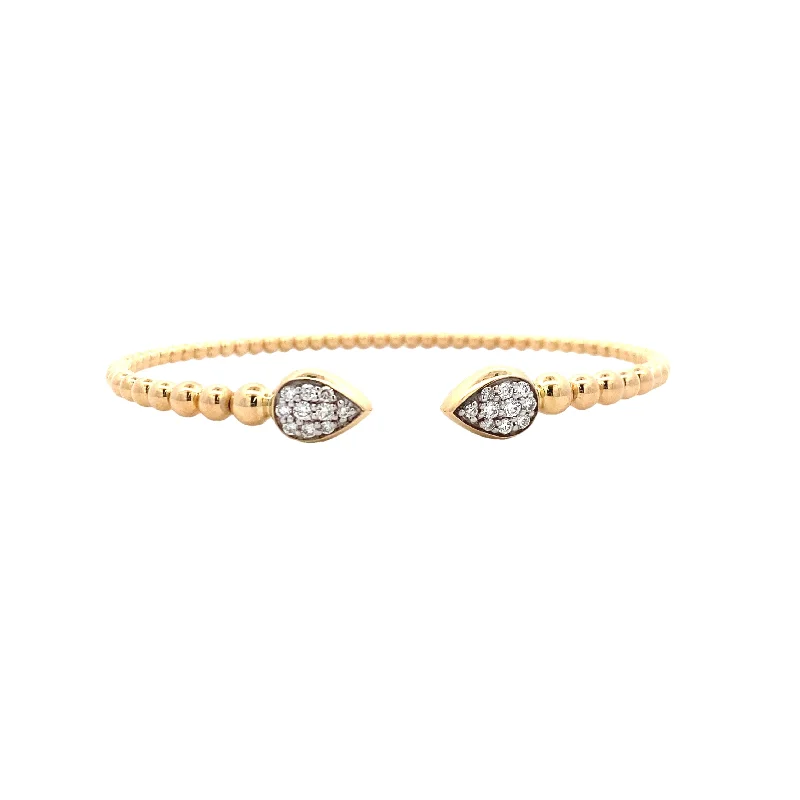 Women’s timeless solitaire engagement ring-Pear Shaped End Diamond Cuff in Yellow Gold by Gabriel NY