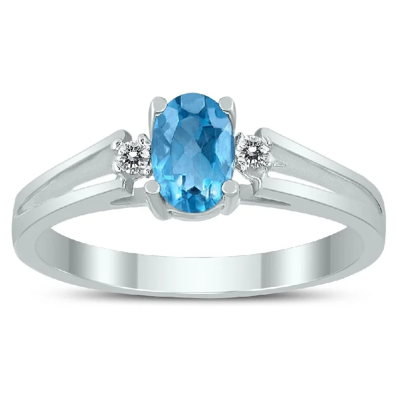 Women’s platinum ring-6X4MM Blue Topaz and Diamond Open Three Stone Ring in 10K White Gold