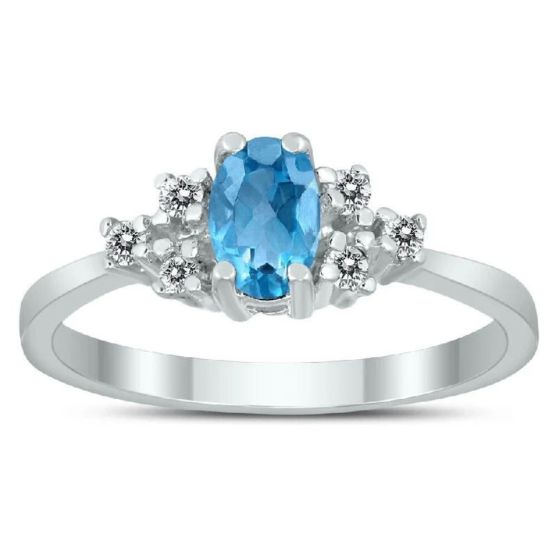 Women’s ring set-6X4MM Blue Topaz and Diamond Regal Ring in 10K White Gold