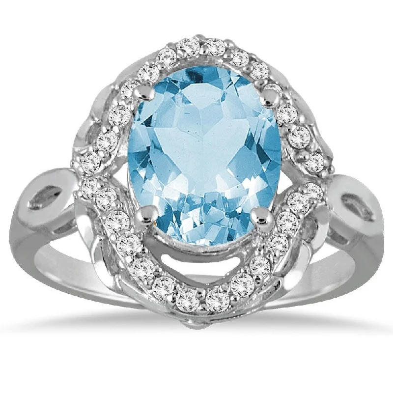 Women’s mixed-metal ring-3 1/2 Carat Oval Blue Topaz and Diamond Ring in 10K White Gold