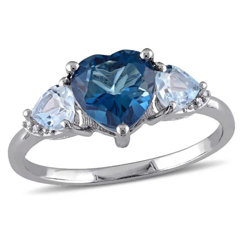 Women’s fine jewelry ring-Miadora 2 1/5 CT TGW Blue Topaz Diamond Accent Triple Heart Ring in Sterling Silver