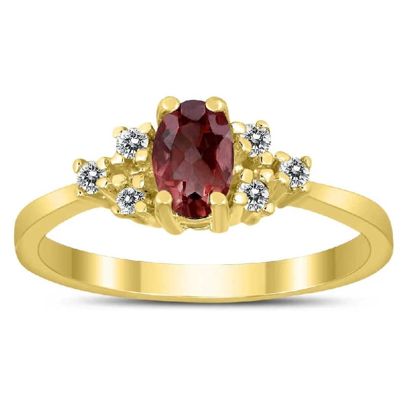 Women’s twist ring-6X4MM Garnet and Diamond Regal Ring in 10K Yellow Gold