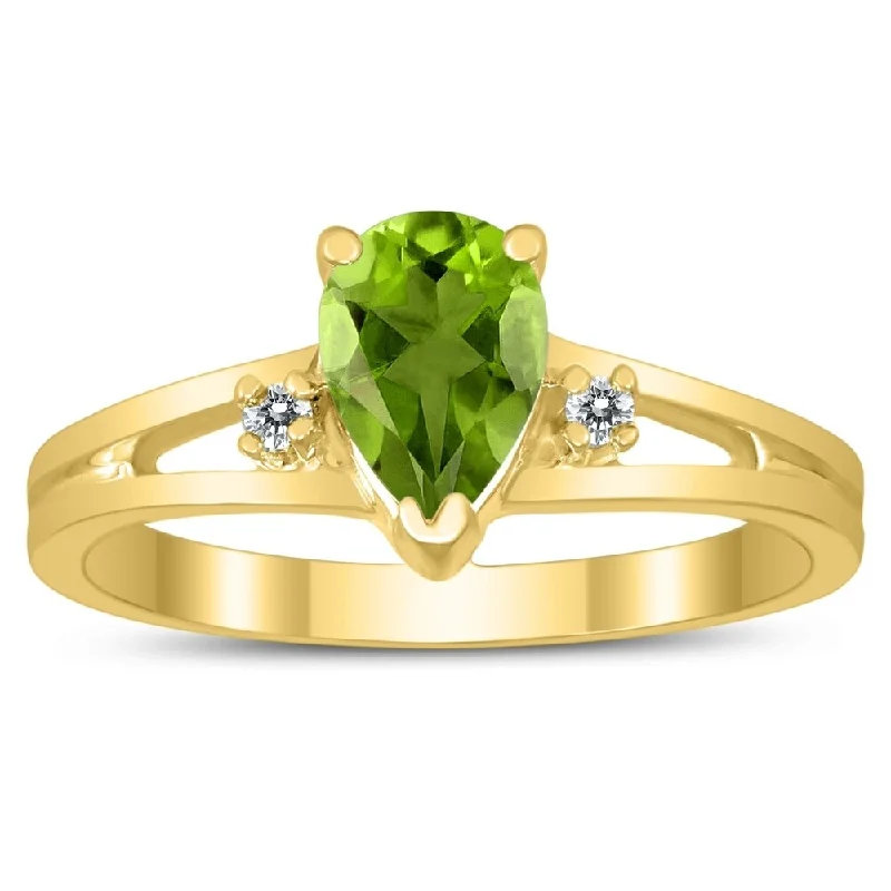 Women’s large statement ring-7X5MM Peridot and Diamond Pear Shaped Open Three Stone Ring in 10K Yellow Gold